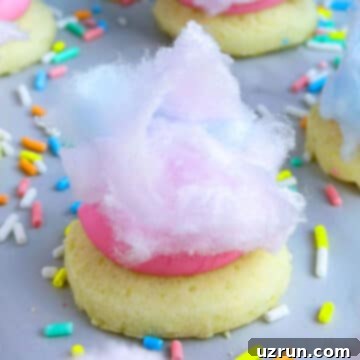 Easy Cotton Candy Cake Mix Cookies 6 Easy Cotton Candy Cookies on White Marble Background With Sprinkles.