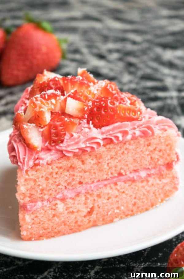 Pink Velvet Strawberry Cake 3 Slice of Pink Cake With Fresh Strawberry Frosting on White Dish