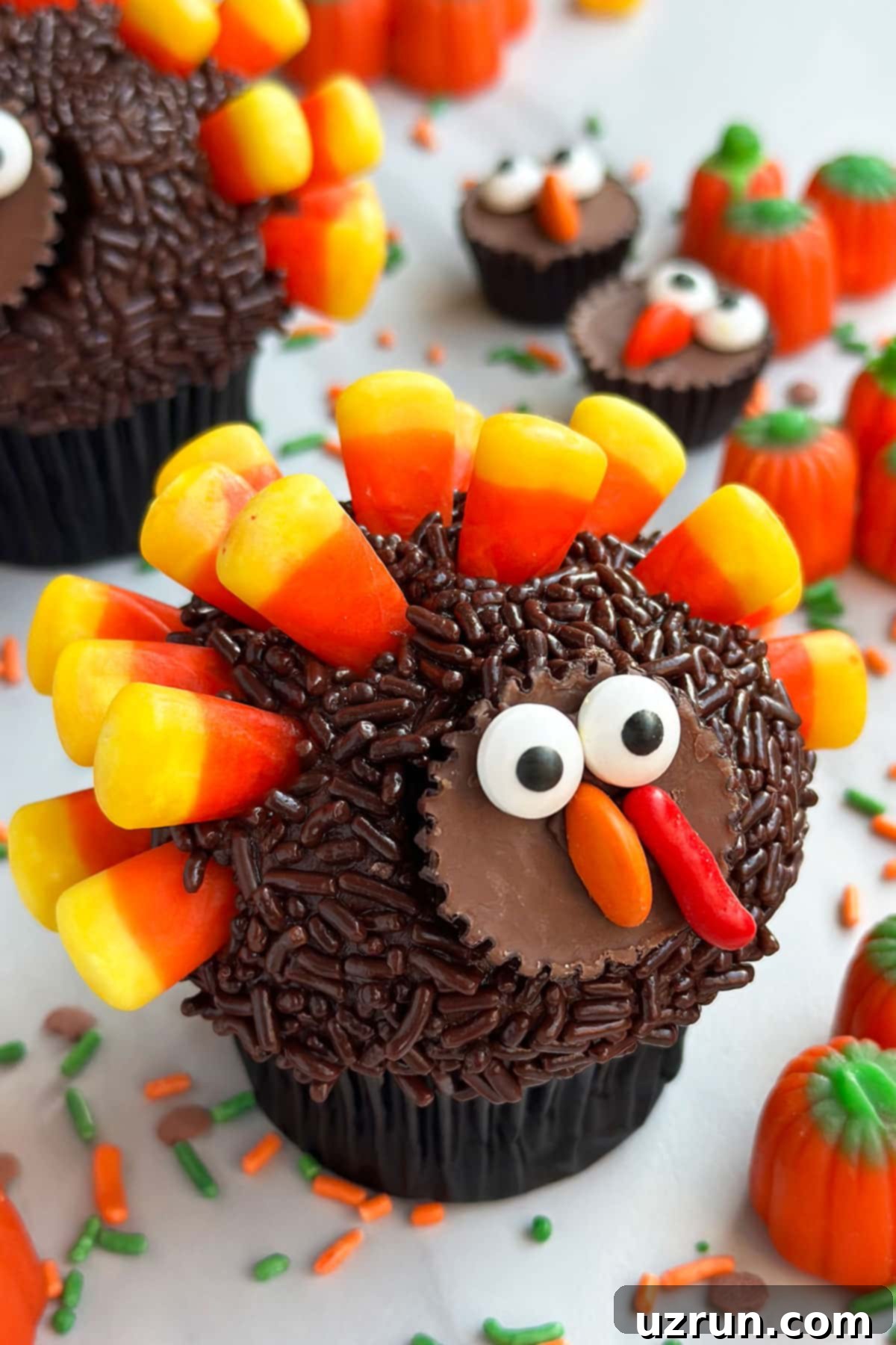 Easy Turkey Cupcakes (Thanksgiving Cupcakes) on White Marble Background.