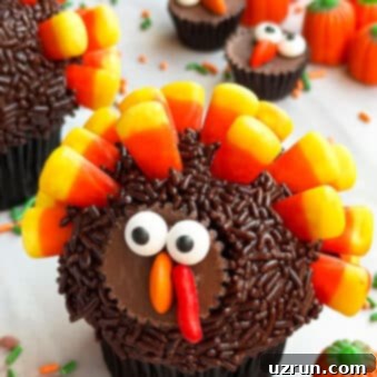 Simple Thanksgiving Turkey Cupcakes 7 Easy Thanksgiving Turkey Cupcakes on White Marble Background.