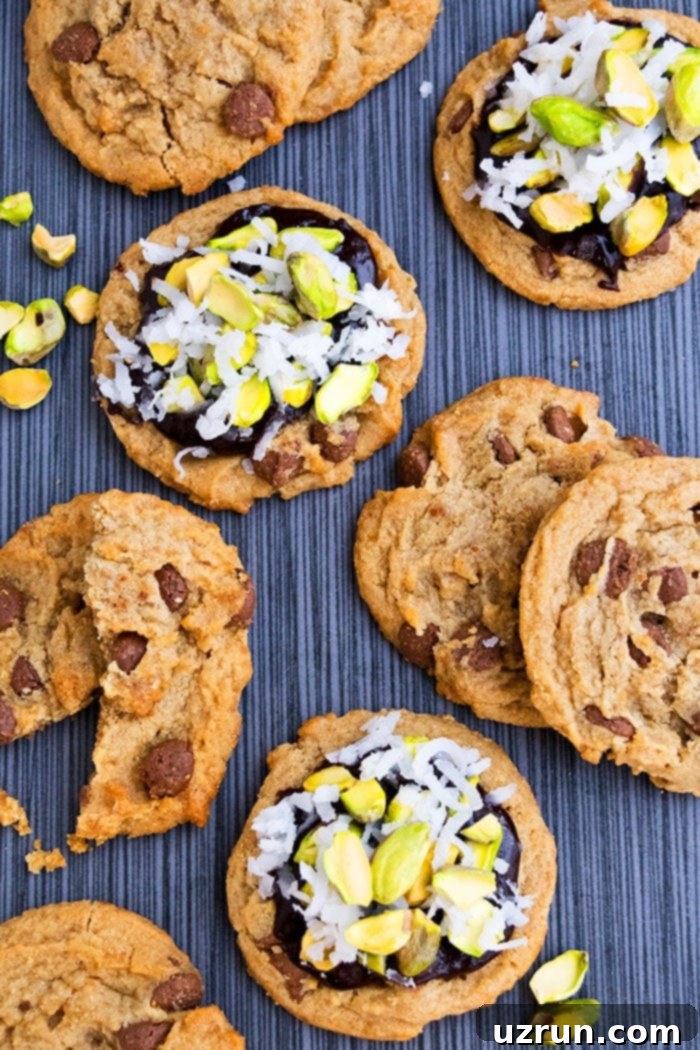Chewy Small Batch Peanut Butter Chocolate Chip Cookies 5 Easy Small Batch Cookies With Peanuts, Pistachios, Ganache on Gray Background- Overhead Shot