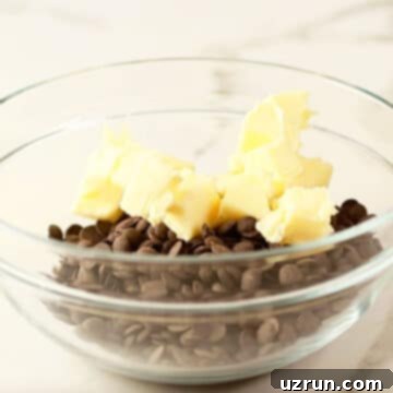 Fudgy Chocolate Orange Brownies 3 Butter and chocolate chips in glass bowl.