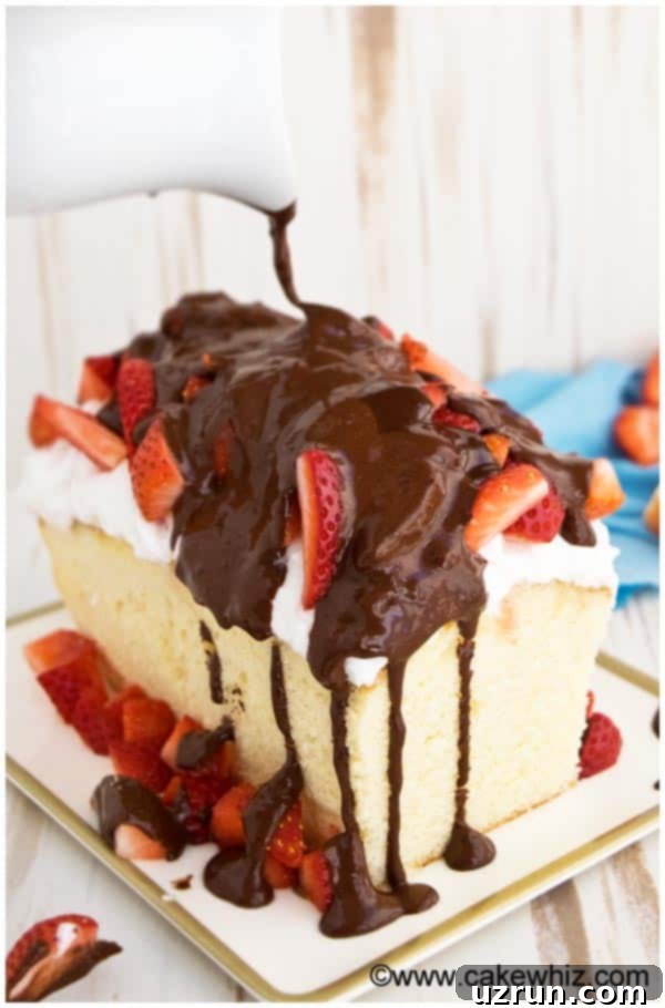 Classic Sour Cream Pound Cake Loaf 3 Old-fashioned sour cream pound cake, showcasing its dense and moist texture, with a luscious stream of chocolate Nutella syrup being drizzled over the top.