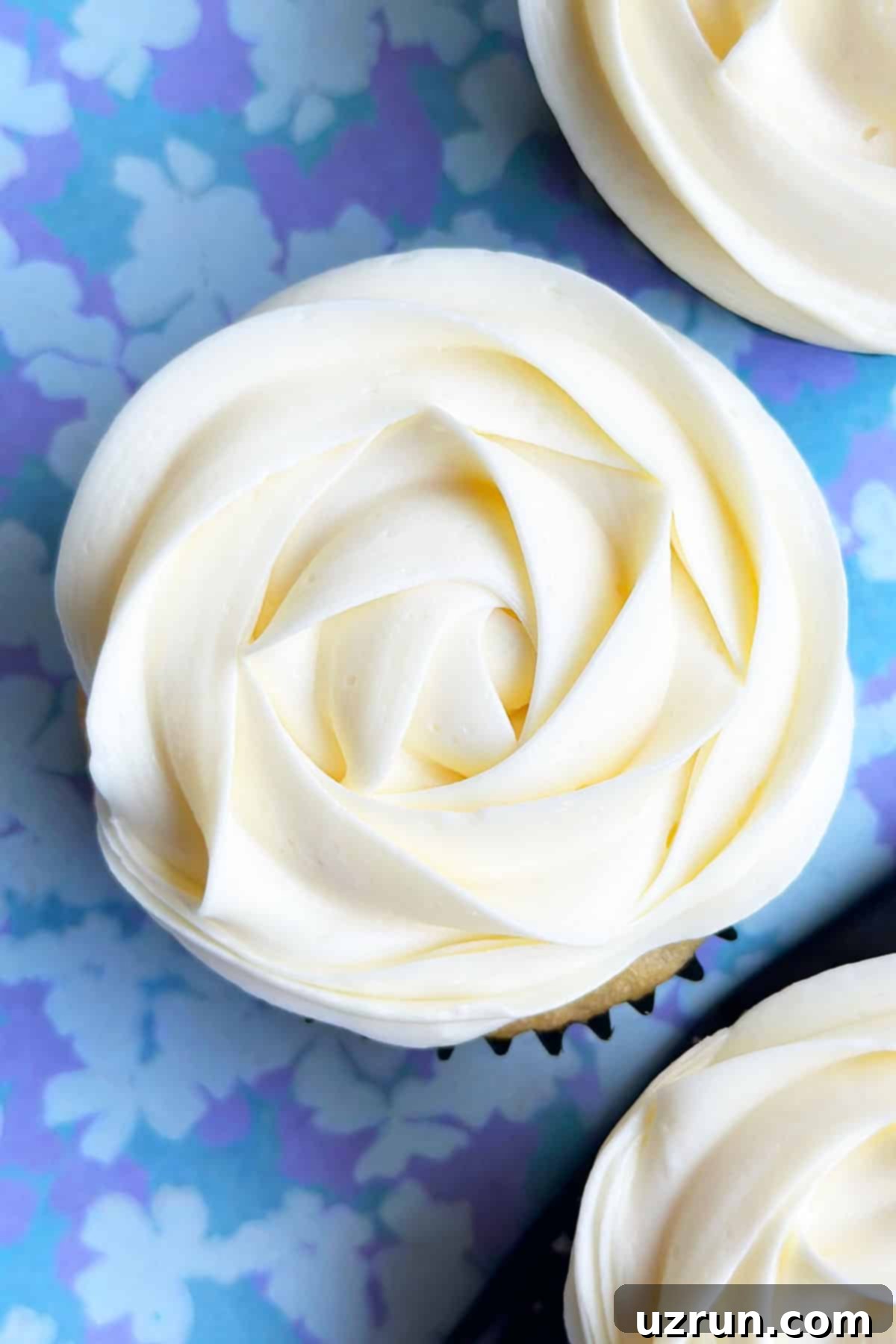 Easy Almond Buttercream Frosting 3 Best Homemade Almond Icing Piped on Top of Cupcake.