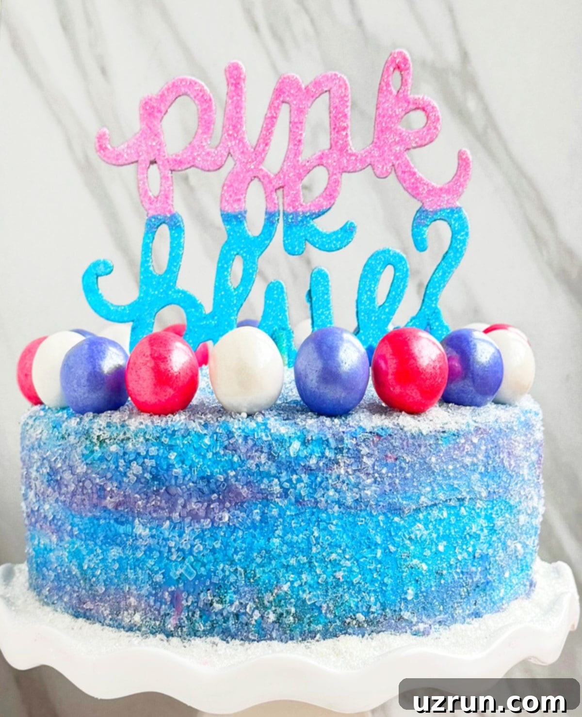 Easy Homemade Gender Reveal Cake With Pink and Blue Buttercream Icing on White Dish. 