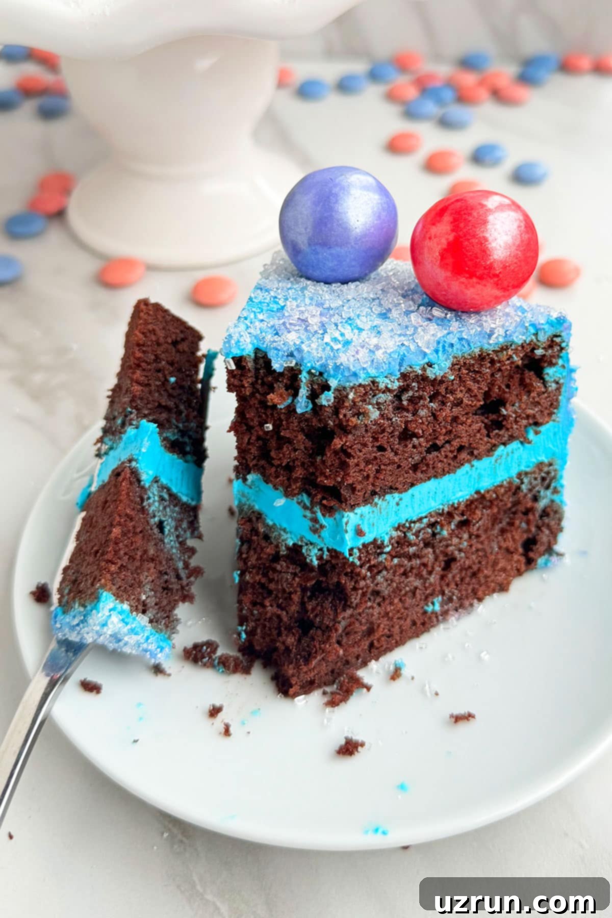Stress-Free Baby Shower Gender Reveal Cake 3 Fork Full of Cake on a White Dish.