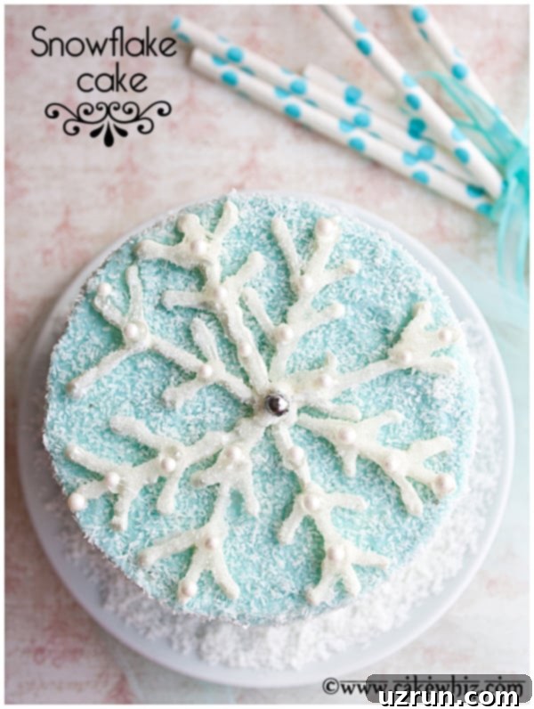 Winter Snowflake Cake 3 Overhead shot of an edible white chocolate snowflake topper, ready to adorn cakes and cupcakes.
