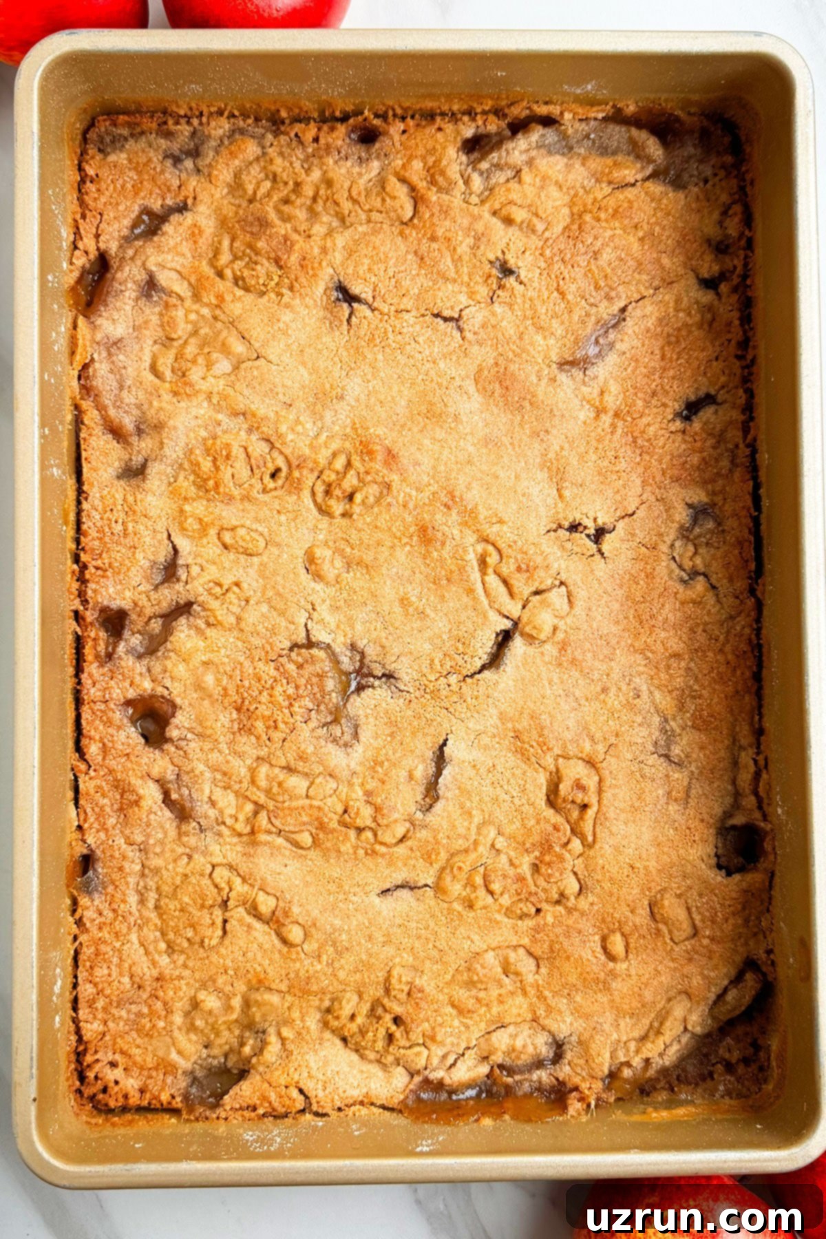 Easy Cake Mix Apple Dump Cake 3 Spiced Apple Cobbler Cake in Rectangle Baking Dish.