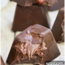 Chilled Gourmet Chocolate Gems 9 Easy Homemade Gourmet Chocolate (Fancy Chocolate) With Nutella Filling on Wood Background