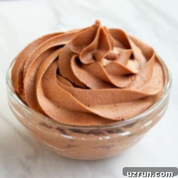 Creamy Nutella Hazelnut Buttercream 14 Easy Nutella Frosting (Buttercream Icing) in Glass Bowl.
