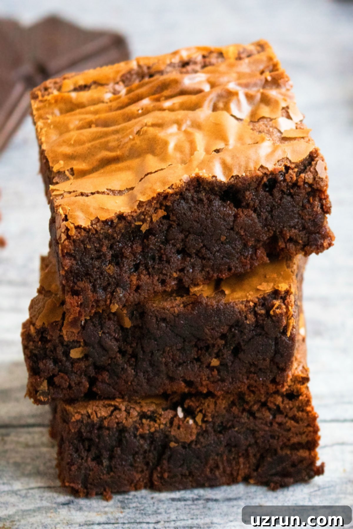 Stack of Easy Nutella Brownies on Rustic Gray Background. 