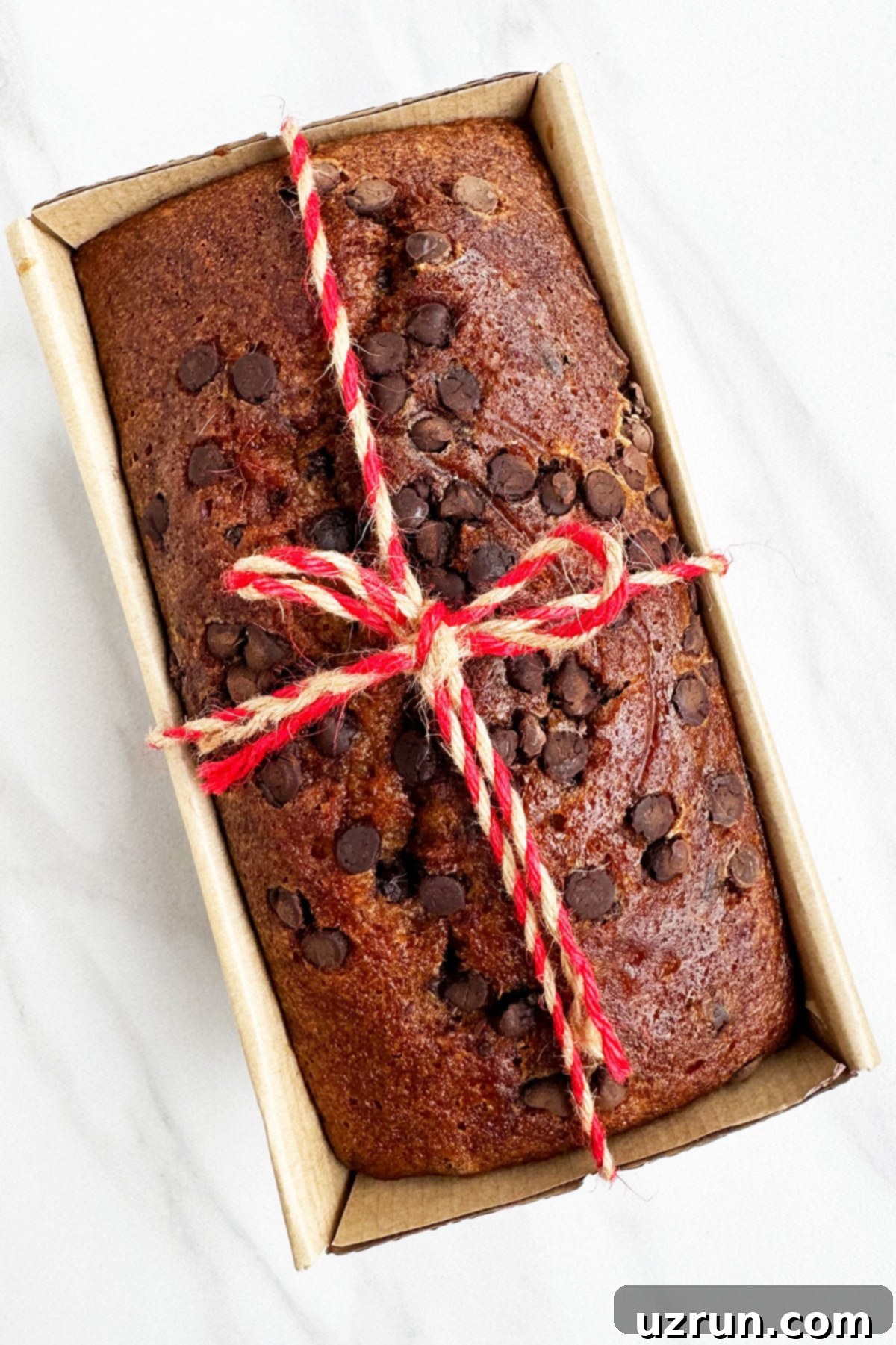 Easy Homemade Food Gifts for Christmas 28 Homemade Banana Bread Gift Wrapped in Ribbon.