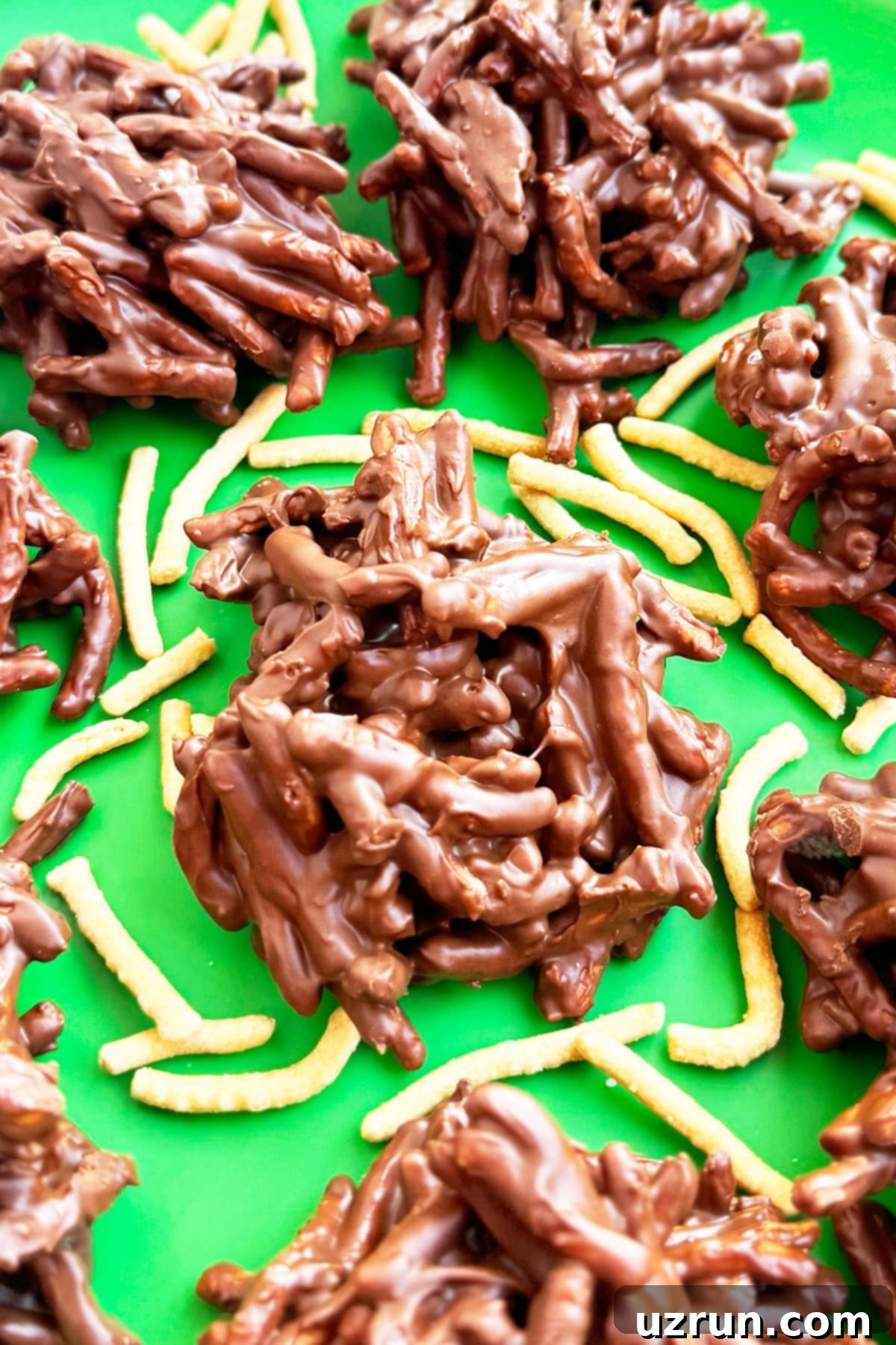 Easy No-Bake Chocolate Haystacks 10 Closeup Shot of Old Fashioned Chow Mein Noodle Cookie Clusters on Green Dish.