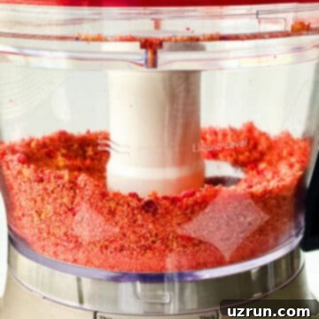 Freeze dried strawberries, butter and Nilla wafers pulsed into small crumbs in food processor. 