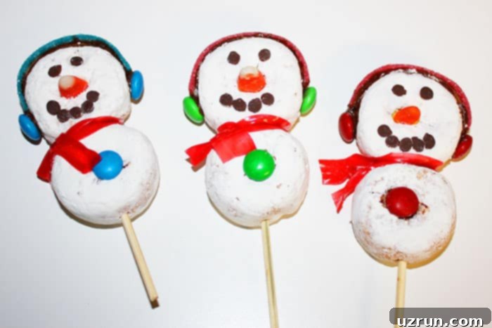 Snowman Cupcakes with Donut Heads 4 Snowman Donut Toppers on White Background