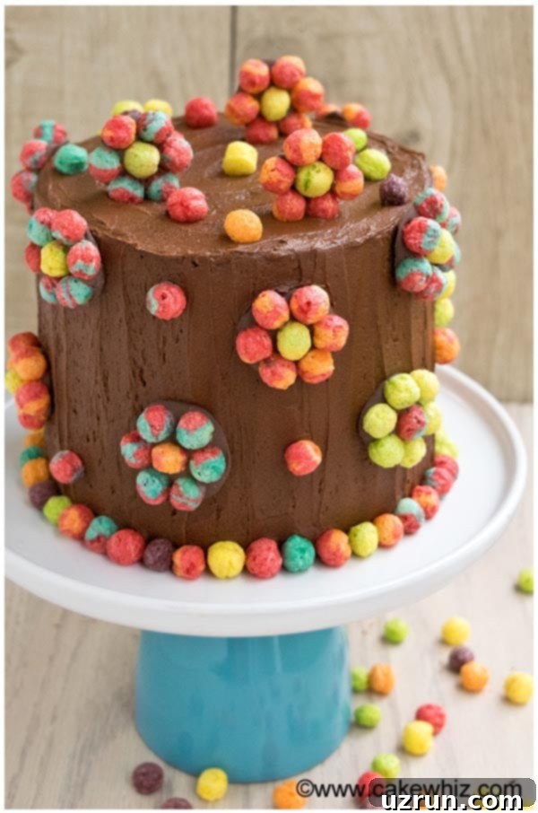 Easy Cereal Cake on White Cake Stand With Wood Background