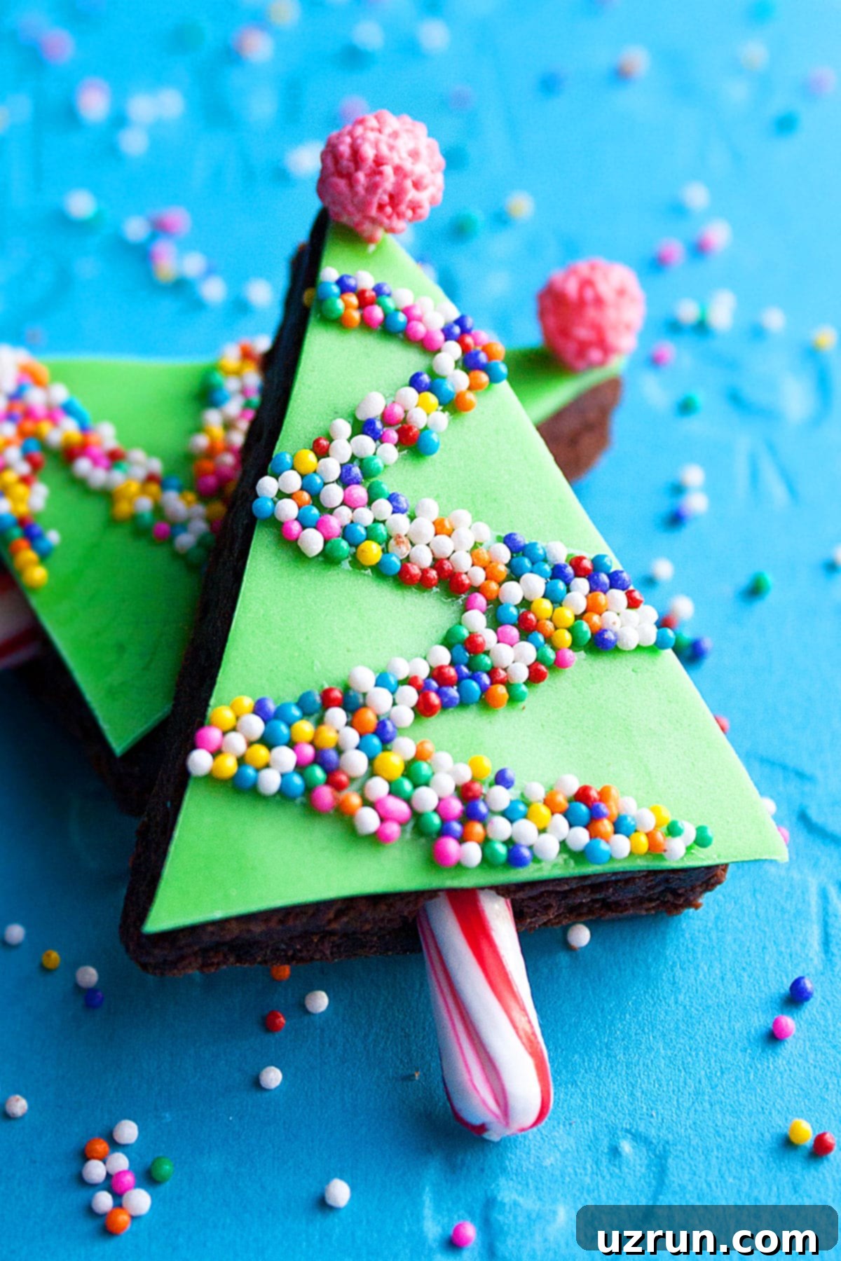 Christmas Tree Brownie Bites 10 Easy Christmas Tree Brownie Bites With Fondant on Blue Background.