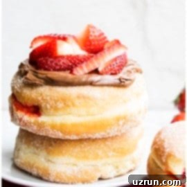 Hanukkah Jelly Donuts 5 Stack of Homemade Jelly Filled Donuts (Sufganiyot) Topped with Nutella and Fresh Strawberries.