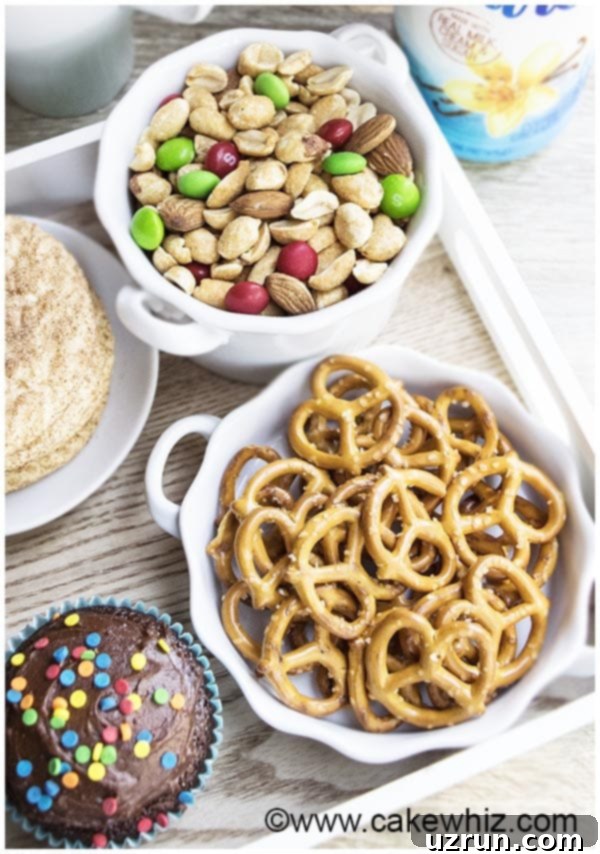 Your Ultimate Home Coffee Oasis 6 Mixed nuts and pretzels in a small bowl on a home coffee bar.