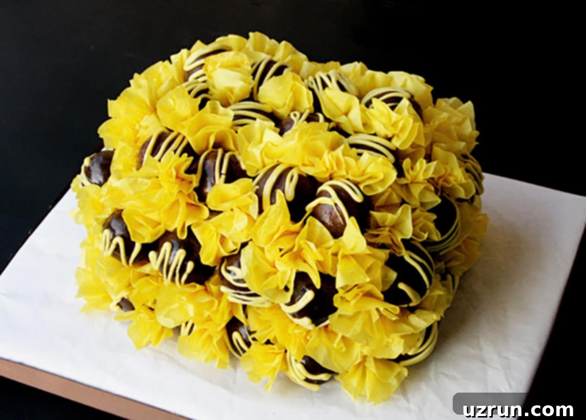 Easy Cake Decorating Ideas for Beginners 27 A festive display featuring various cake balls arranged decoratively, showcasing their versatility.