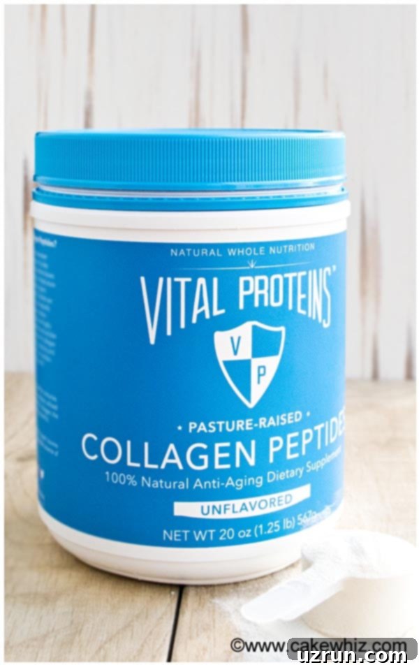 Pumpkin Cheesecake With Gingersnap Crust 5 Jar of Vital Proteins Collagen Peptides on a Rustic Brown Background