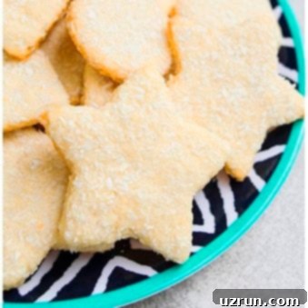 Coconut Cut-Out Sugar Cookies 5 Easy Cut Out Coconut Sugar Cookies in Patterned Dish.