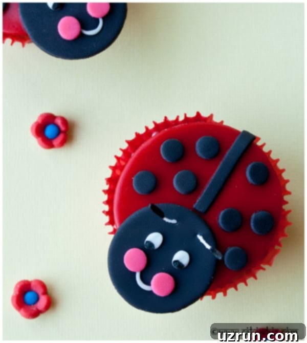 Crafting Unique English Titles 4 Assorted homemade kids cupcakes with ladybug toppers on a yellow background, perfect for children's parties.