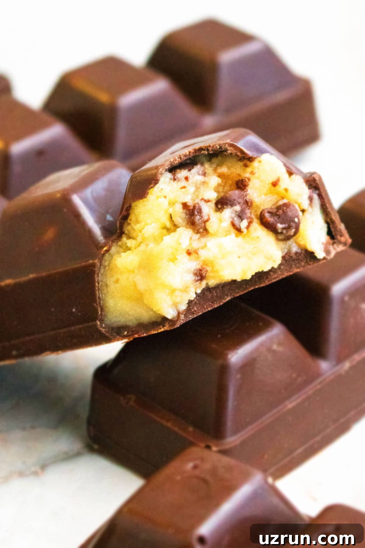 Eggless Chocolate Chip Cookie Dough Bars 5 Closeup Shot of Partially Eaten Chocolate Bar.