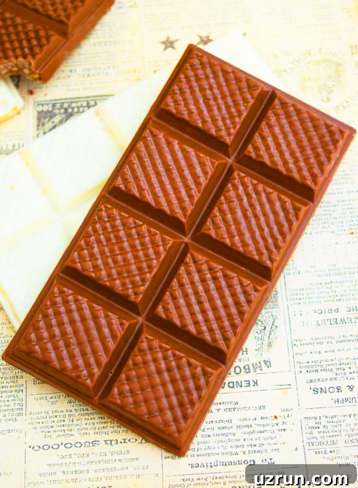 Peanut Butter Chocolate Crispy Bars 4 Peanut Butter Chocolate Bar on Sheet of Newspaper.
