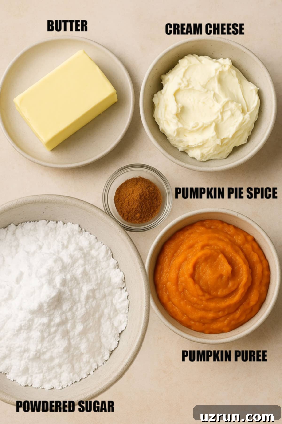 Easy Pumpkin Cream Cheese Frosting 3 Ingredients in individual bowls on neutral beige background.