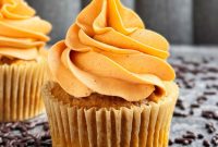 Cozy Pumpkin Cupcakes with Spiced Cream Cheese Frosting