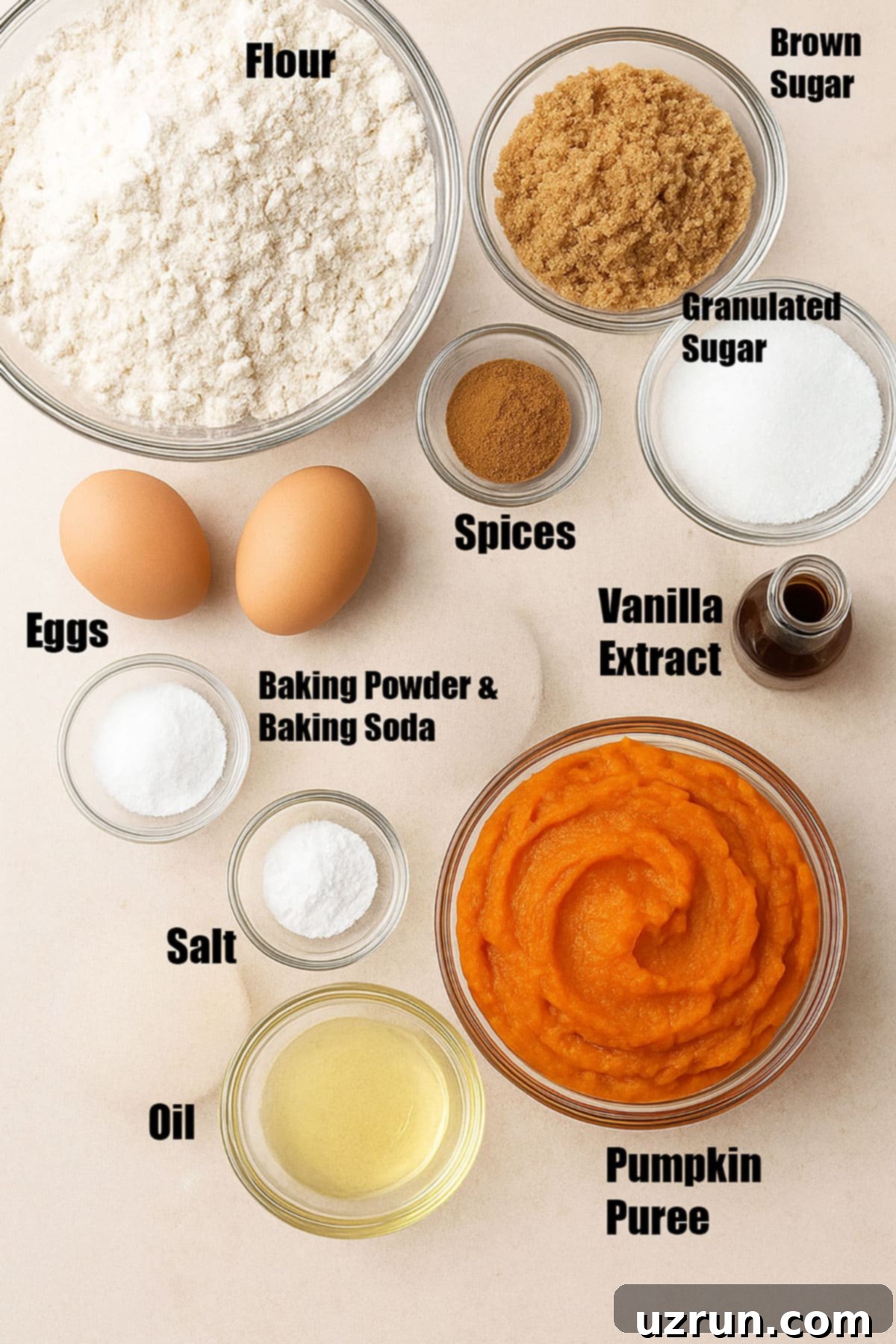 Cozy Pumpkin Cupcakes with Spiced Cream Cheese Frosting 3 Individual ingredients on neutral beige background.